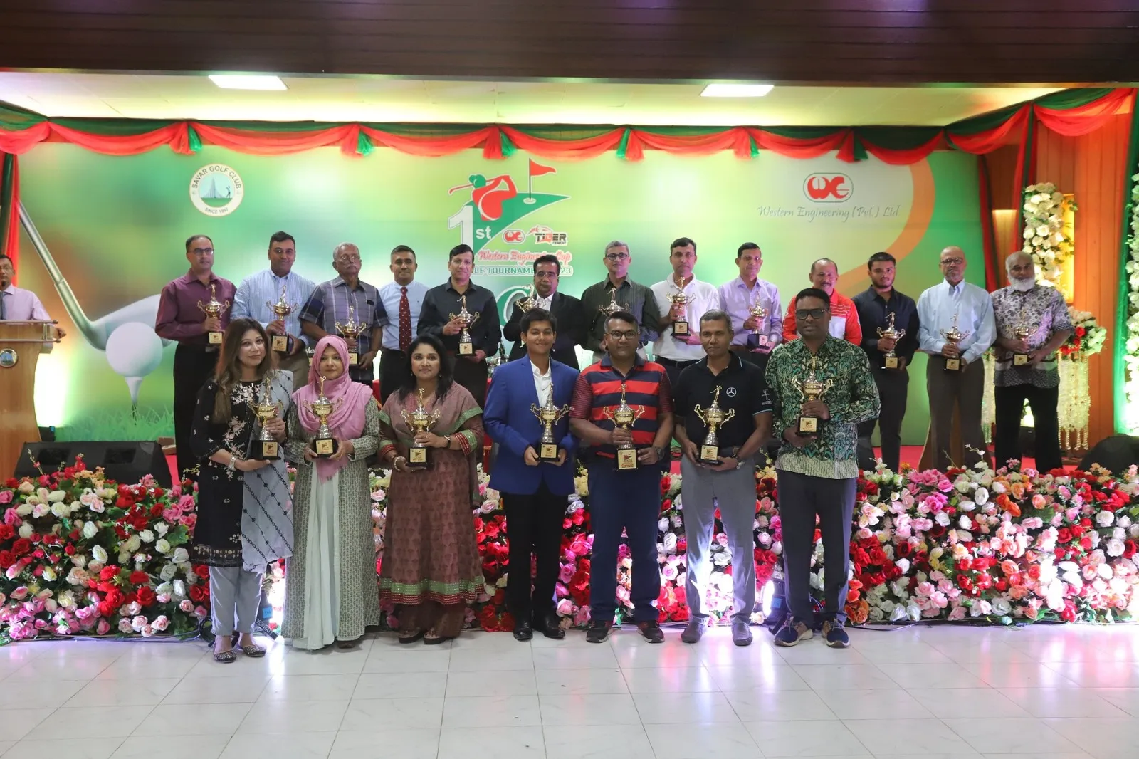 Winners and officials with the trophies after presentation
